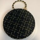 AWESOME GOLD AND BLACK ROUND PURSE WITH G&B WRISTELT HANDLE Photo 0