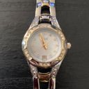 Relic BY FOSSIL-TWO TONE WATCH Beautiful gold and silver tone stainless steel watch with little diamond rhinestones, excellent condition, I have attached a video showing the watch works great. Photo 3