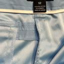 DKNY NWOT  GOLF BERMUDA SHORTS SKY BLUE WOMEN’S SIZE 12   3 Zip Pockets Photo 4