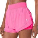 Sweaty Betty  Neon/ sonic pink athletic shorts.  Size small Photo 0