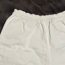 EXPRESS  High-rise White Denim Pleated Shorts Photo 4