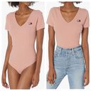 Tommy Hilfiger  Tommy Jeans Womens Ribbed Knit Short Sleeve Bodysuit Size M Pink Photo 1