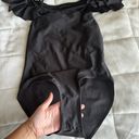 Boutique Black One-piece Photo 1