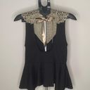 Arden B Unique black and gold blouse with beautiful details open back with bow. Medium Photo 1