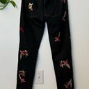 Alice + Olivia 
Jane Embroidered and Studded Skinny Jeans in Washed Black Photo 1