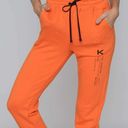 Koral  Oblivion Matte Sweatpant in Jaspar Orange Photo 6