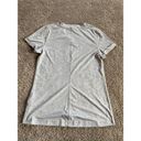 The North Face  woman’s small gray athletic top Photo 3