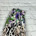 Bebe  Floral Animal print blend joggers with faux leather side pockets. Size M Photo 4