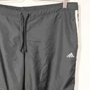 Adidas  Size XL Black Three Stripe Cropped Wind Pant Photo 1