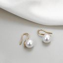 Elegant white pearl dangle drop earrings for women Gold Photo 1