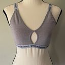 Juicy Couture Gray and White Cut-Out Sports Bra. Fits a Medium to Large. Photo 0