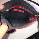 Tommy Hilfiger  Crossbody purse bag in black w/ red accents.  Excellent Condition Photo 5