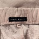 Brandy Melville baby pink sweatpants Photo 1