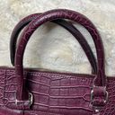 Liz Claiborne  purple pebble handbag. Cell phone pocket in back. Zip closure. Photo 9