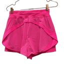 Sweaty Betty  Neon/ sonic pink athletic shorts.  Size small Photo 9