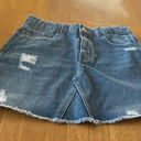 ZARA  denim mini skirt, size 11/12. It is slightly distressed with a raw hem. Photo 0