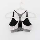 Calvin Klein / Revolve New Flex Motion Medium Impact Sports Bra in Black Color Block Photo 7