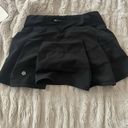 Lululemon Black Pace Rival  skirt. size 0, 12 inch inseam. Photo 1