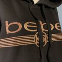 NWT New $89  Sport BEBE Gold LOGO Black Hoodie Pullover Sweatshirt XL Photo 1