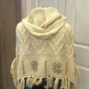 Hooded poncho Size M Photo 1