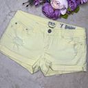 Indigo Rein Yellow Distressed Shorts Photo 0