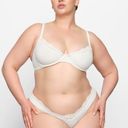 SKIMS  FITS EVERYBODY LACE UNDERWIRE BRA NWT - MARBLE white size 42D NWT Photo 0