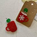 Boutique | Glittering Green and Red Snowflake Mug Dangling Christmas Earrings Photo 2