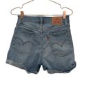 Levi's Levi’s high-rise rolled up shorts wedgie denim shorts. Size 28. Medium wash Photo 6