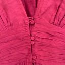 Rebellion Aje  Tucked Peplum V-Neck Long Sleeve Corset Top in Magenta Photo 6