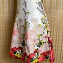 NIKIBIKI | White Floral Flared Pleated Skirt Photo 1