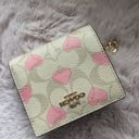 Coach Snap Wallet In Signature Canvas With Heart Print Photo 8