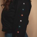 Le lis Embellished Stars Long Sleeve Faux Wrap V-Neck Crop Sweatshirt in Black Photo 2