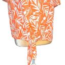 Nine Britton  cute new white tie front top with orange floral design. Photo 1