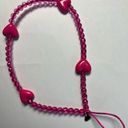 Velvet Caviar Hot pink cell phone charm Photo 0