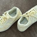 New Balance  classic style running shoes. Barely worn. Color- yellow. Size 7 Photo 4