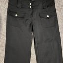 Bebe NWOT stretchy  capri pants. Sz S Photo 1