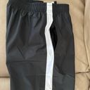 Nike Women's Sportswear Repel Essential Woven Jogger Pants Photo 9