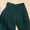 Earthbound dark green flowy pants Photo 1