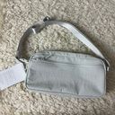 Lululemon multi pocket black crossbody bag 2.5L Vapor Photo 4