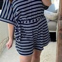 Entro  blue striped romper with belt Photo 0