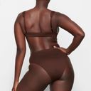 SKIMS Low plunge Cocoa large Swim Or Bandeau Photo 2