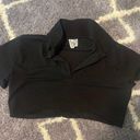 Divided Cropped Black Polo Photo 0