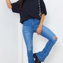 Pretty Little Thing Mid Blue Distressed Knee Flare Jean Photo 0