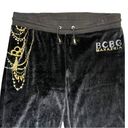 BCBGMAXAZRIA BCBG Velour Flare Black Track Pants with Gold and Rhinestone Details Size Medium Photo 2