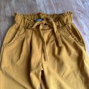 Soho Apparel Mustard yellow skinny leg high waisted pant with adjustable tie belt Photo 3