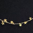 Gold bracelet with small gold star charms Photo 0