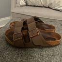 Only Size 6/6.5 Brown Birkenstocks. In good condition,  noticeable wear on soles of the shoes. Worn a few times! Photo 3