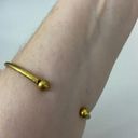 Boutique Large open bangle bracelet, gold tone Photo 2