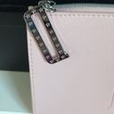 Dior Make up bag in light pink, zipper pull has the D logo Photo 3