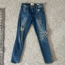 Frame le skinny de Jeanne distressed cropped light wash stretchy jeans 28 Photo 5